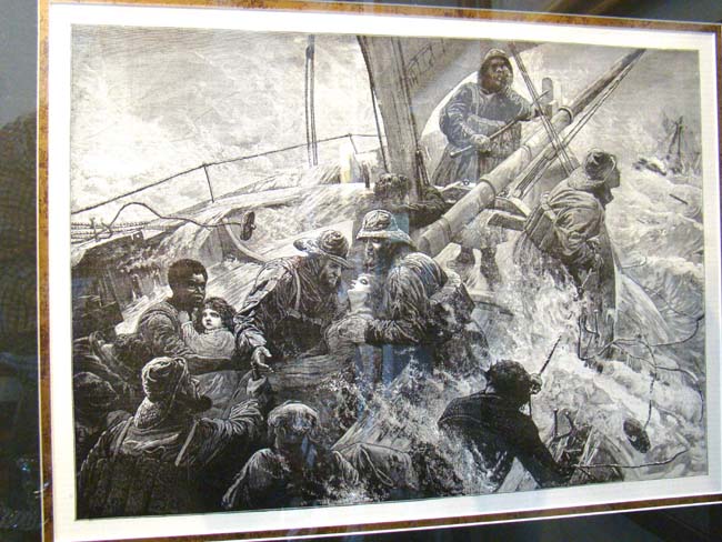 A late 19th or early 20th century print depicting women and children being rescued from a sinking ship